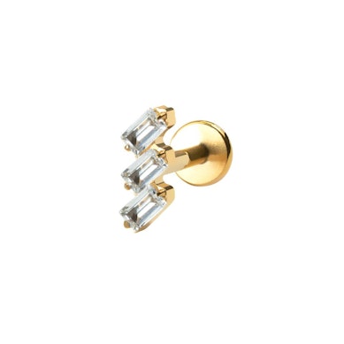 Labret av titan med baguettslipte stener