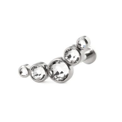 Labret av titan med push-in topp i forskjellige farger med innfattet sten