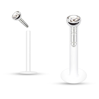 Labret av ptfe med mange forskjellige fargede stener