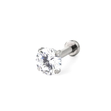 Push-in labret av titan med innfattede stener