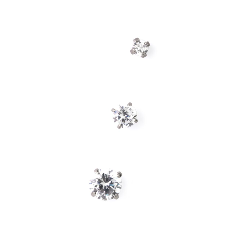 Push-in labret av titan med innfattede stener