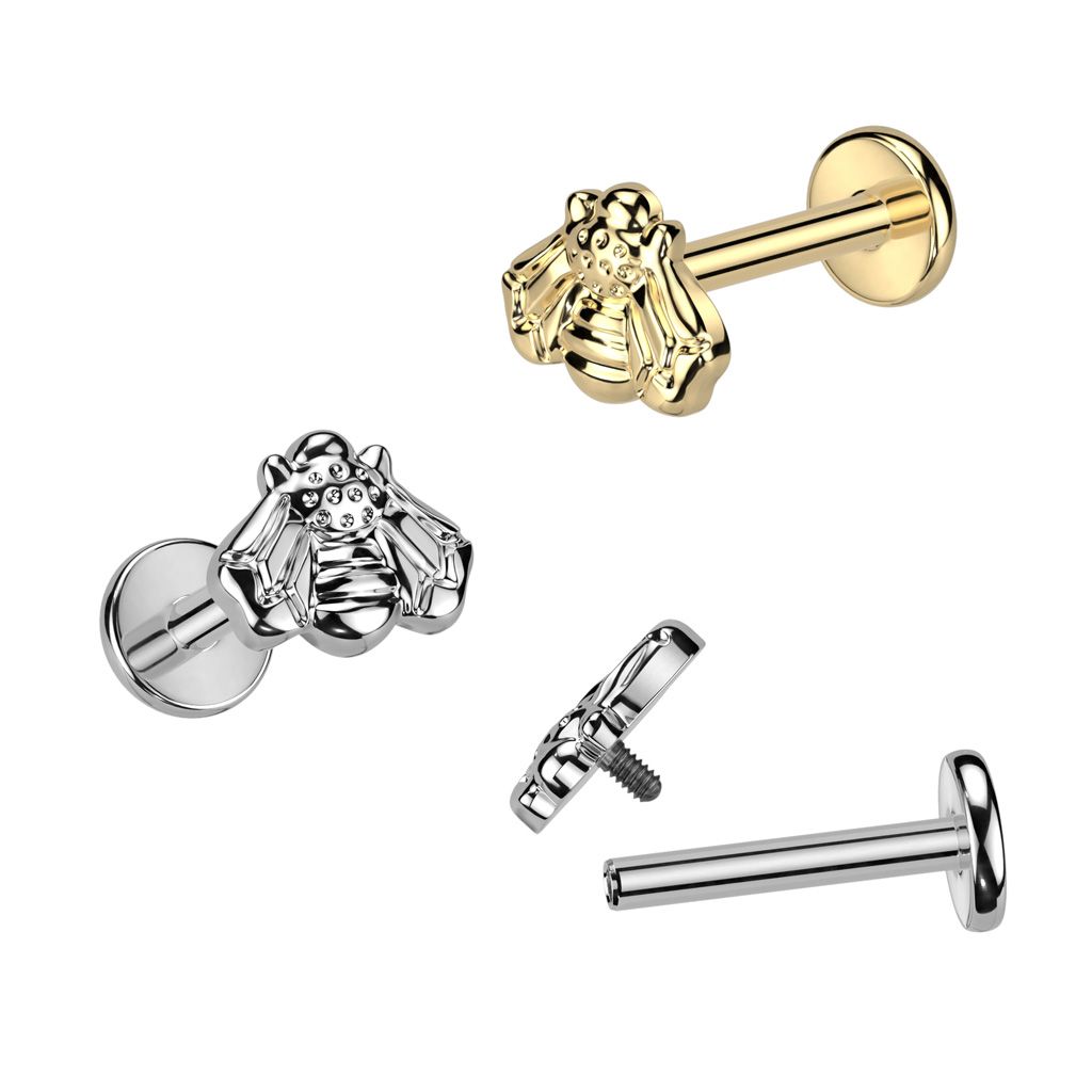 Innvendig gjenget labret av titan med bidesign på toppen