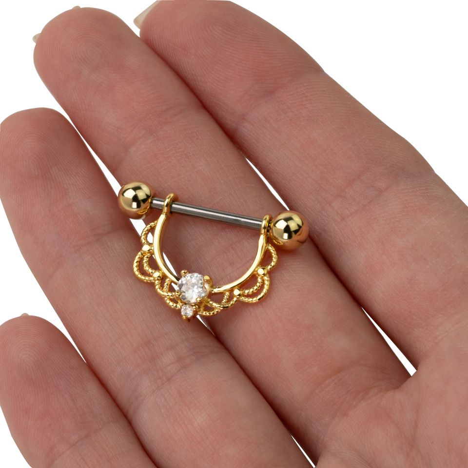 Brystpiercing med filigran og sten