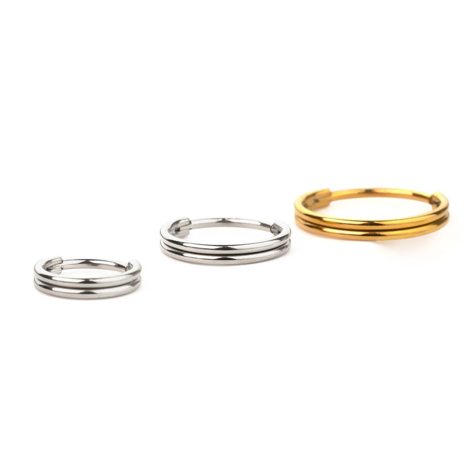 Hengslet ring med dobbel ringeffekt