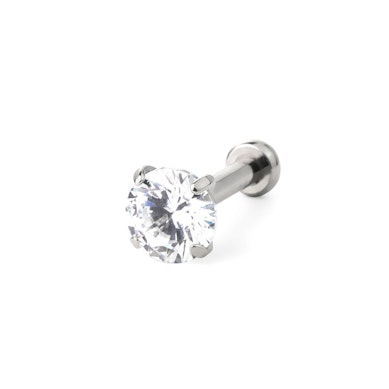 Push-in labret av titan med innfattede stener
