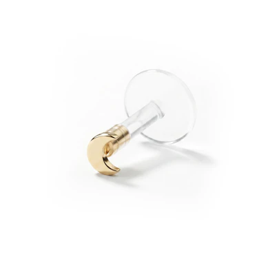 Labret av 14 karat gull med halvmåne