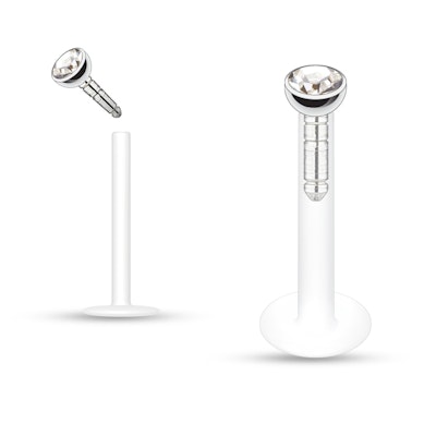 Labret av ptfe med mange forskjellige fargede stener