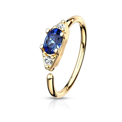Ring med oval sten i flere farger