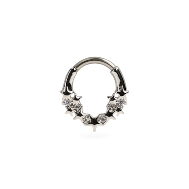 Forovervendt ring med stjerner og stener
