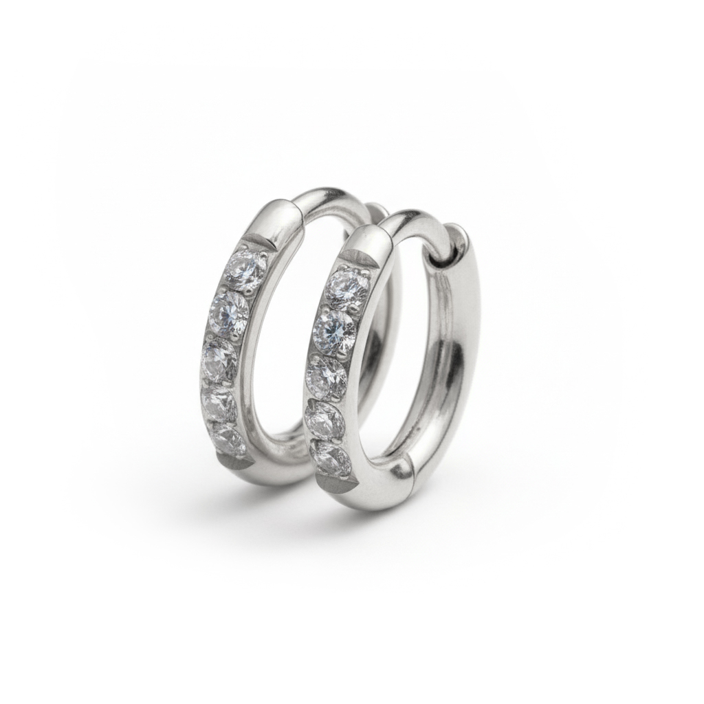 Huggieringer i titan med edelstener