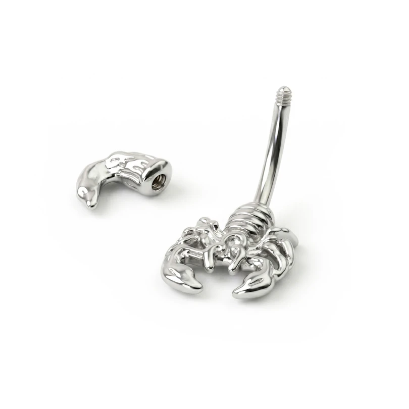 Navlepiercing med skorpion