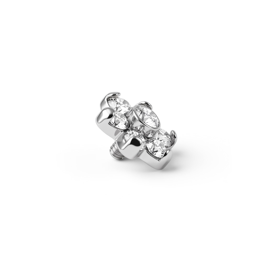 Dermal anchor med sten formet som blomst