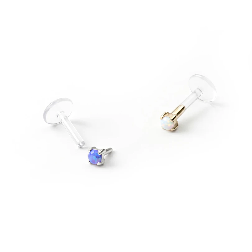 Labret av 14 karat gull med opalsten