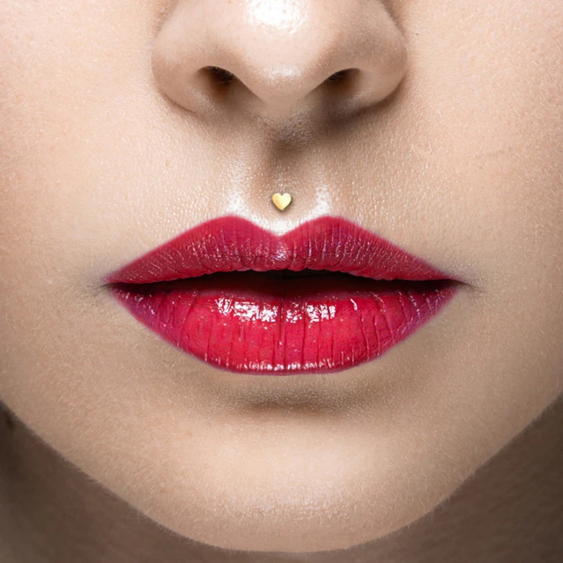 Labret av 14 karat gull med hjertetopp