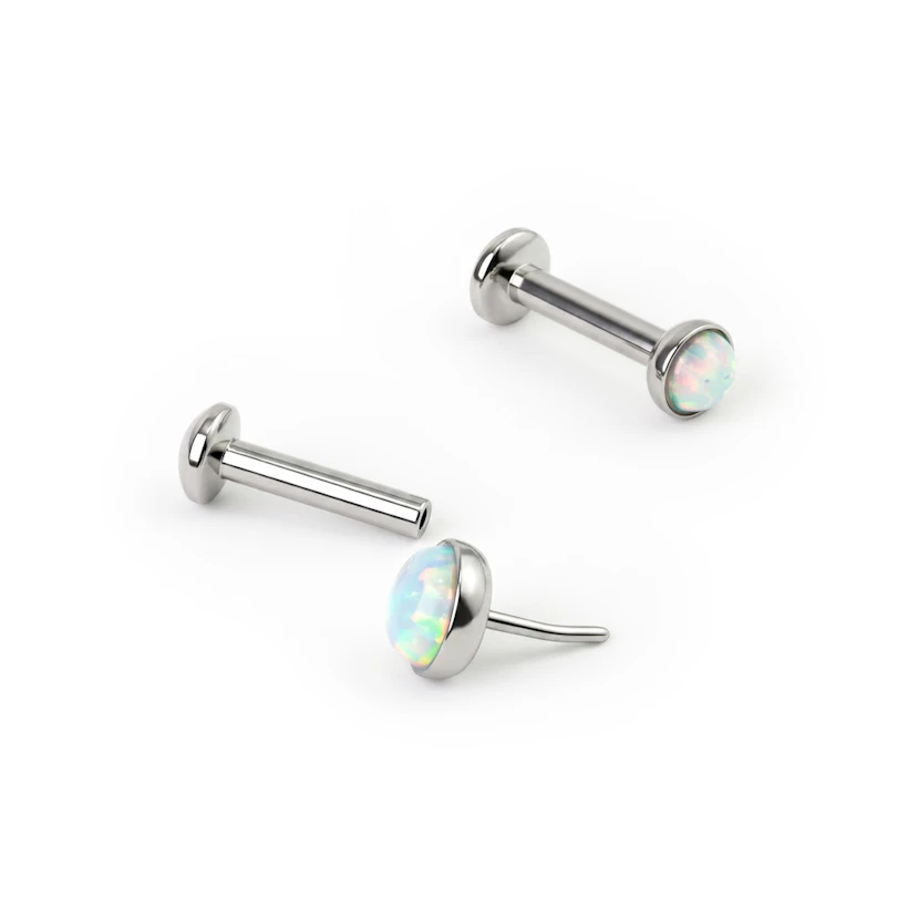 Push-in labret med opal