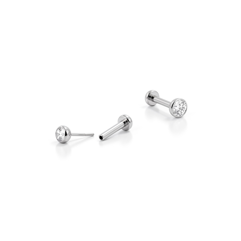 Push-in labret i titan med innfattet sten