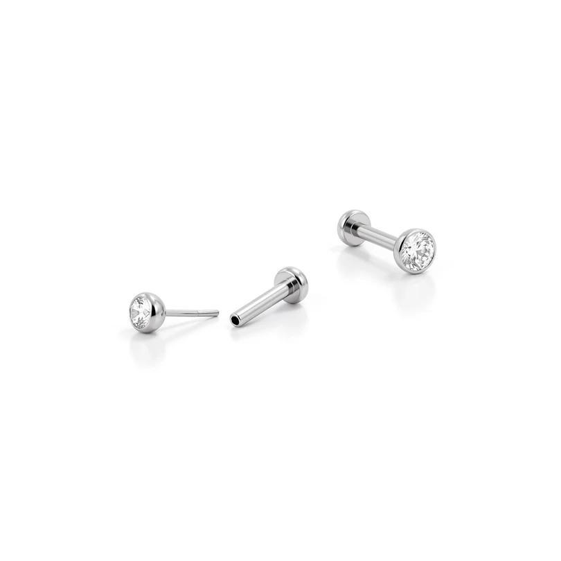 Push-in labret i titan med innfattet sten