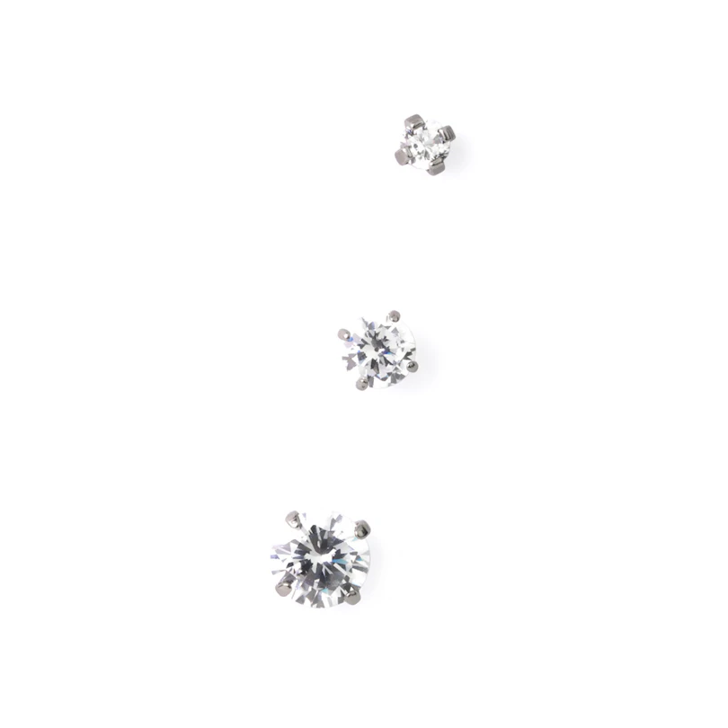Push-in labret av titan med innfattede stener