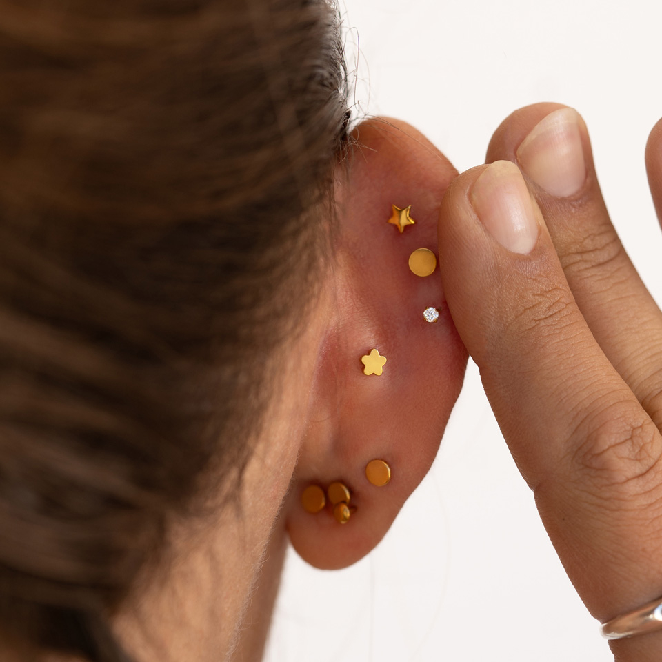 Dobbelsidig gjengeløs titanlabret med flat stjerneformet bakside av sten