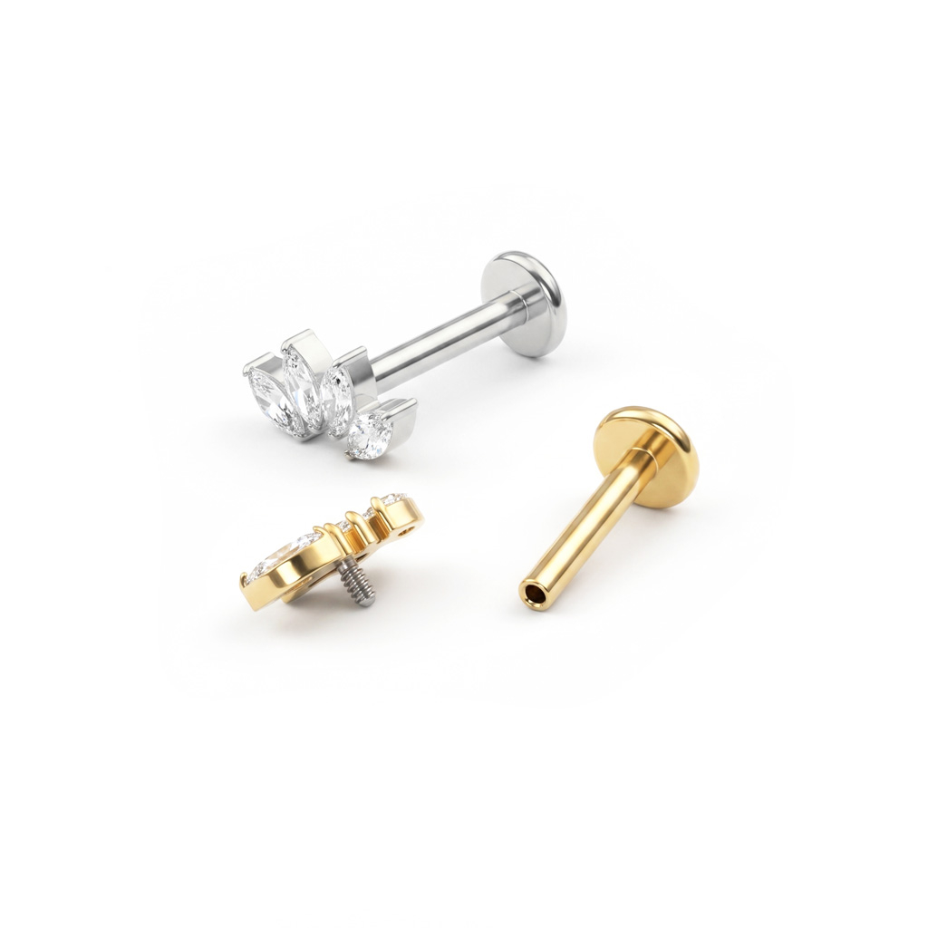 Titanlabret med en trio av marquiseslipte stener