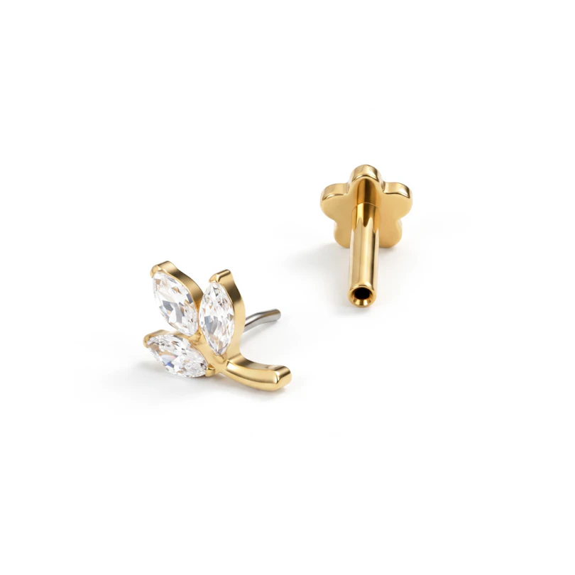 Labret formet som blad med bakside av titan