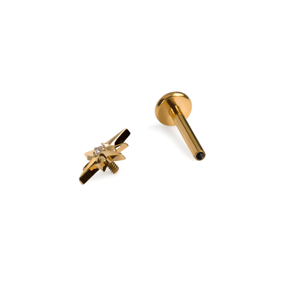 Stjernelabret i titan med sten i midten