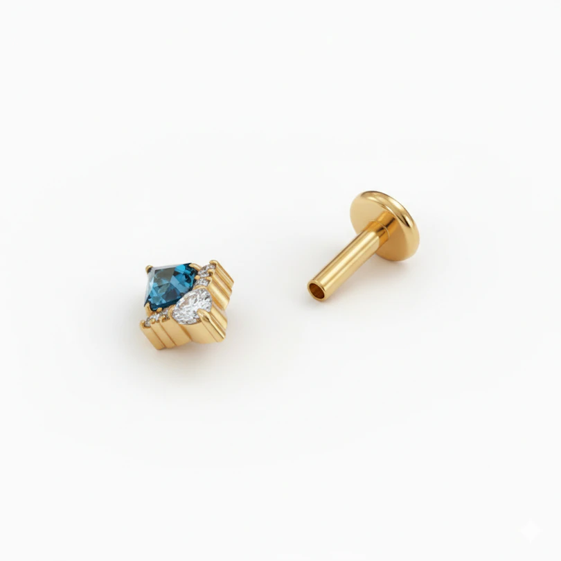 Diamantformet labret i titan med blå sten