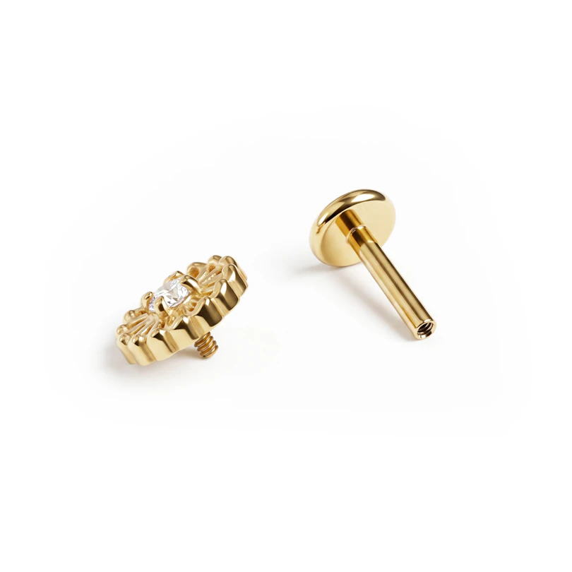 Delikat blomsterlabret i titan