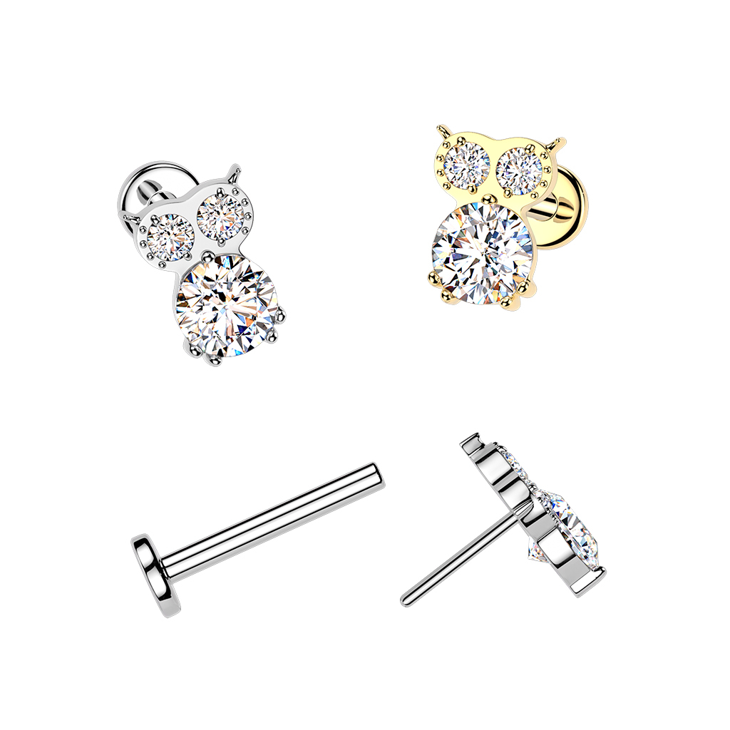 Titanlabret i form av ugle med edelstener 