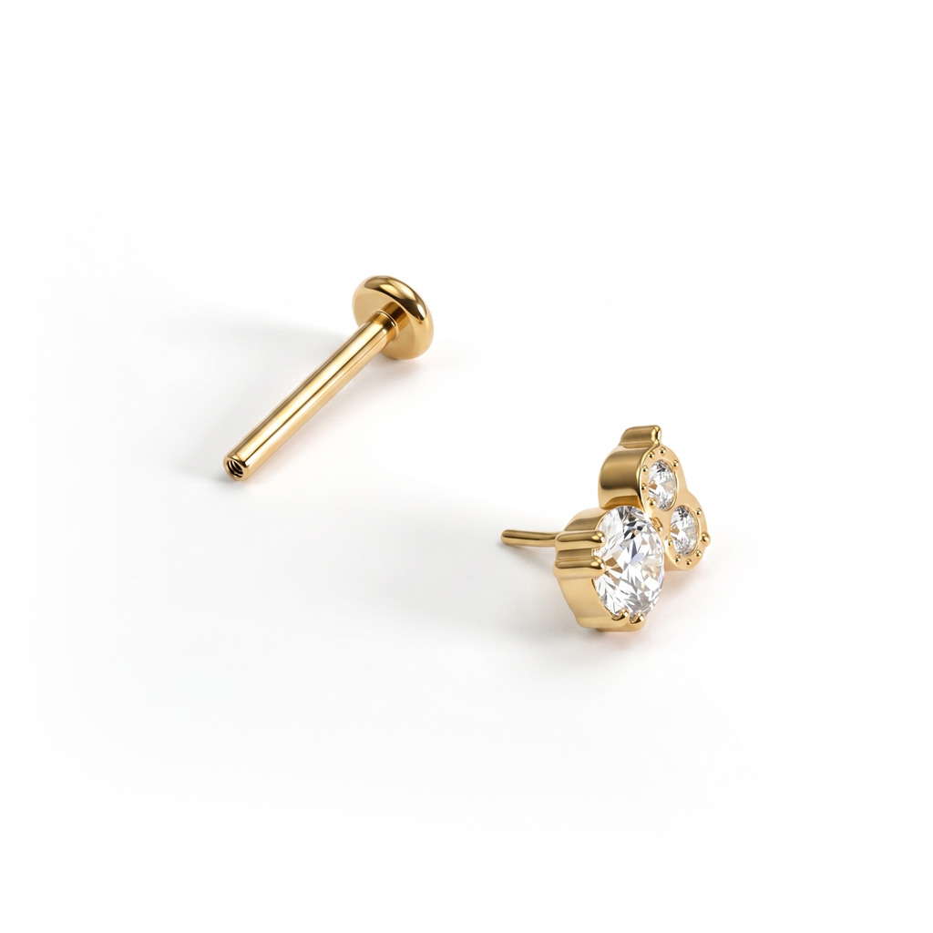 Titanlabret i form av ugle med edelstener 