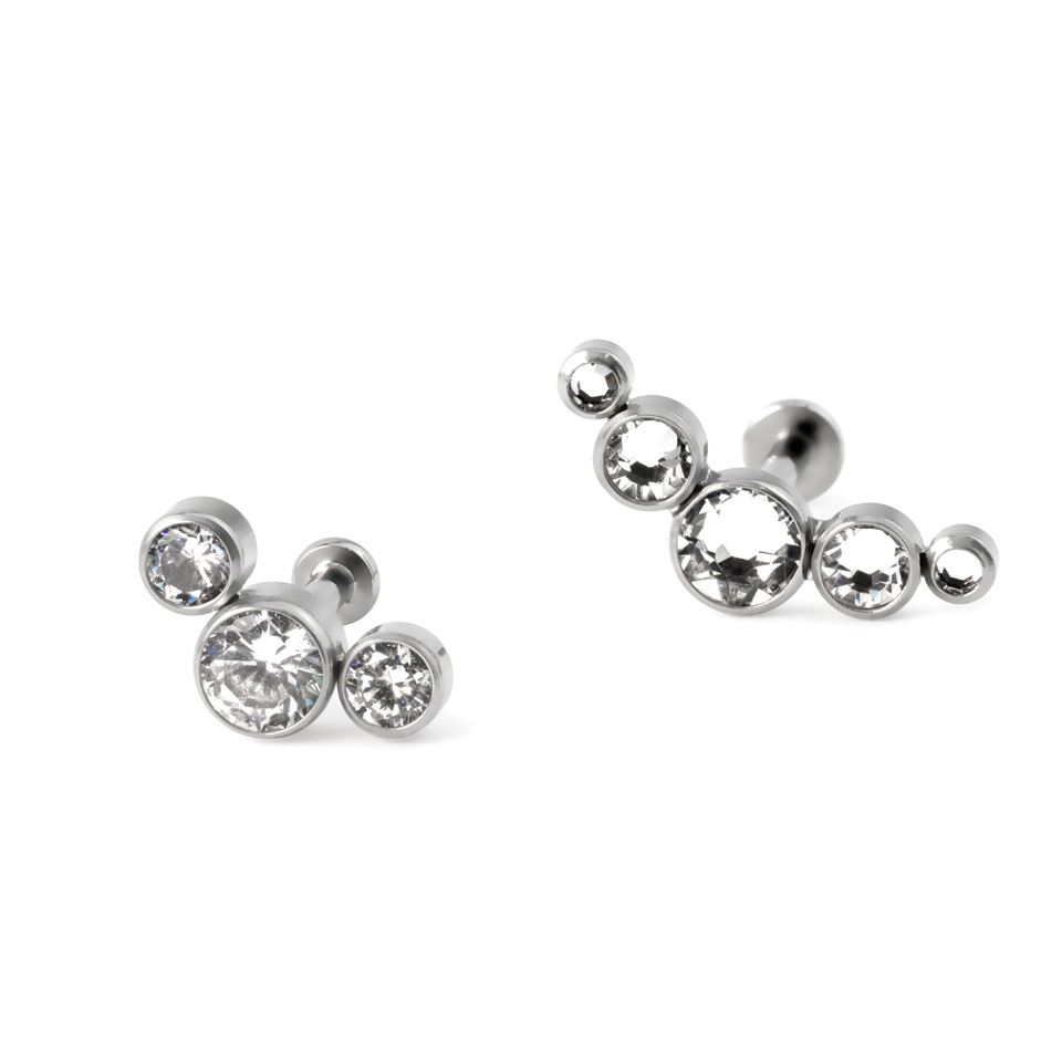 Labret av titan med push-in topp i forskjellige farger med innfattet sten