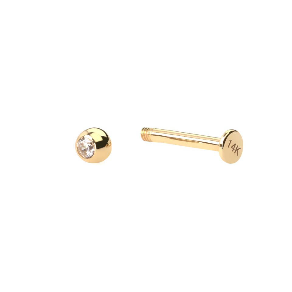 Labret av 14K gull med sten