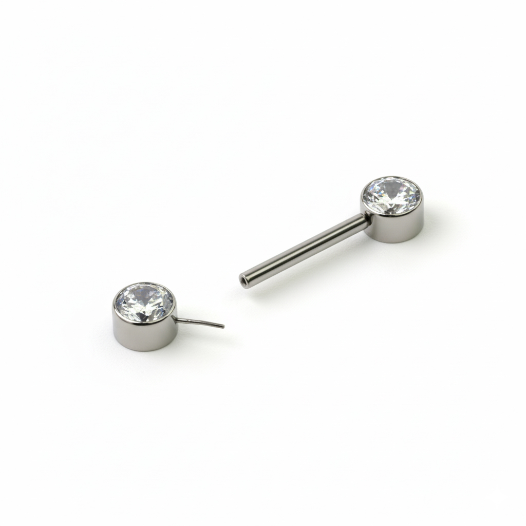 Nipplebarbell laget av titan med gjengeløs push-in med stener