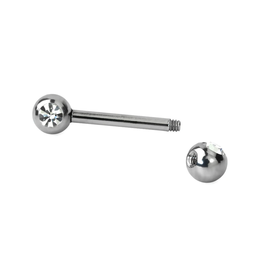 Brystpiercing med sten i flere farger