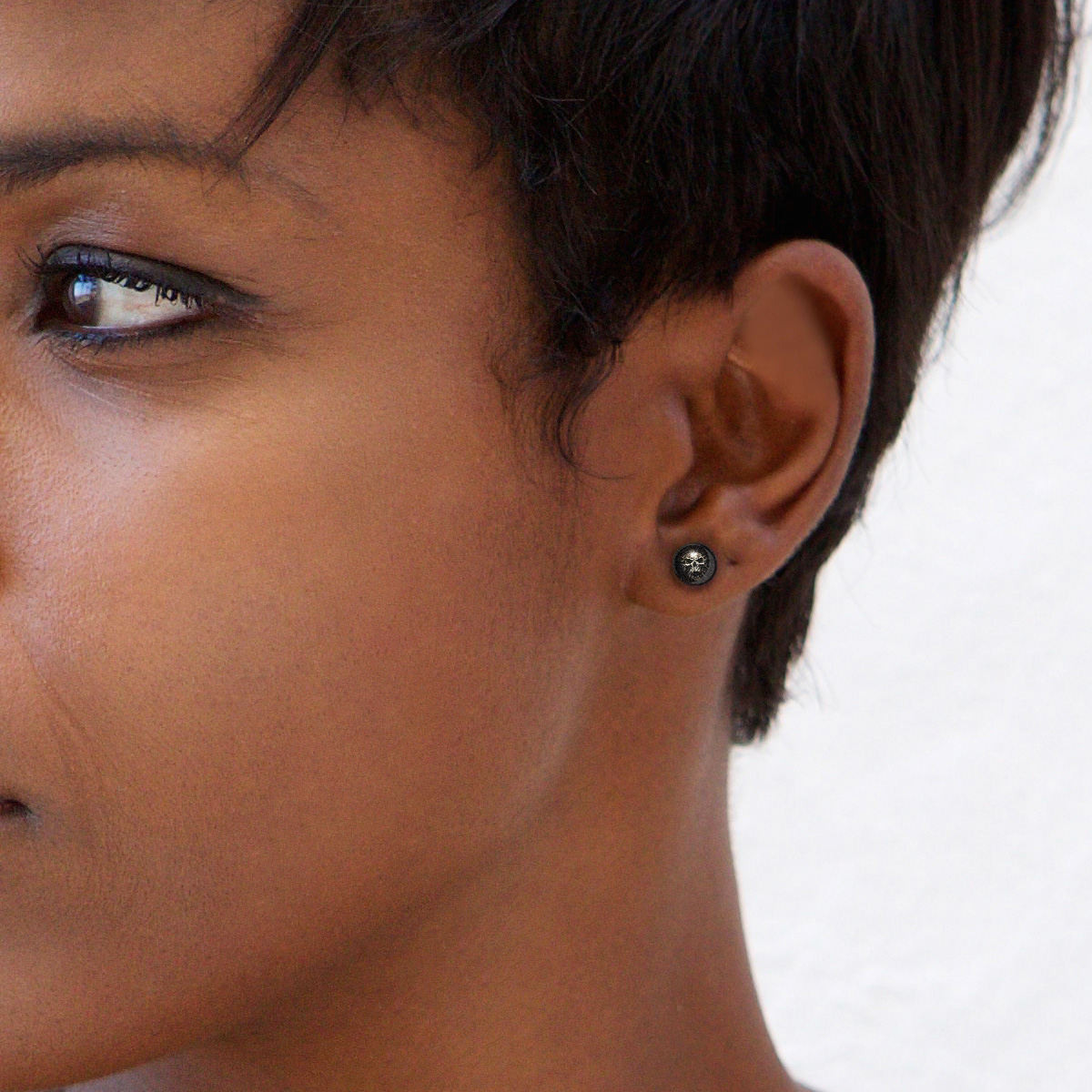 Plug av akryl med hodeskalle