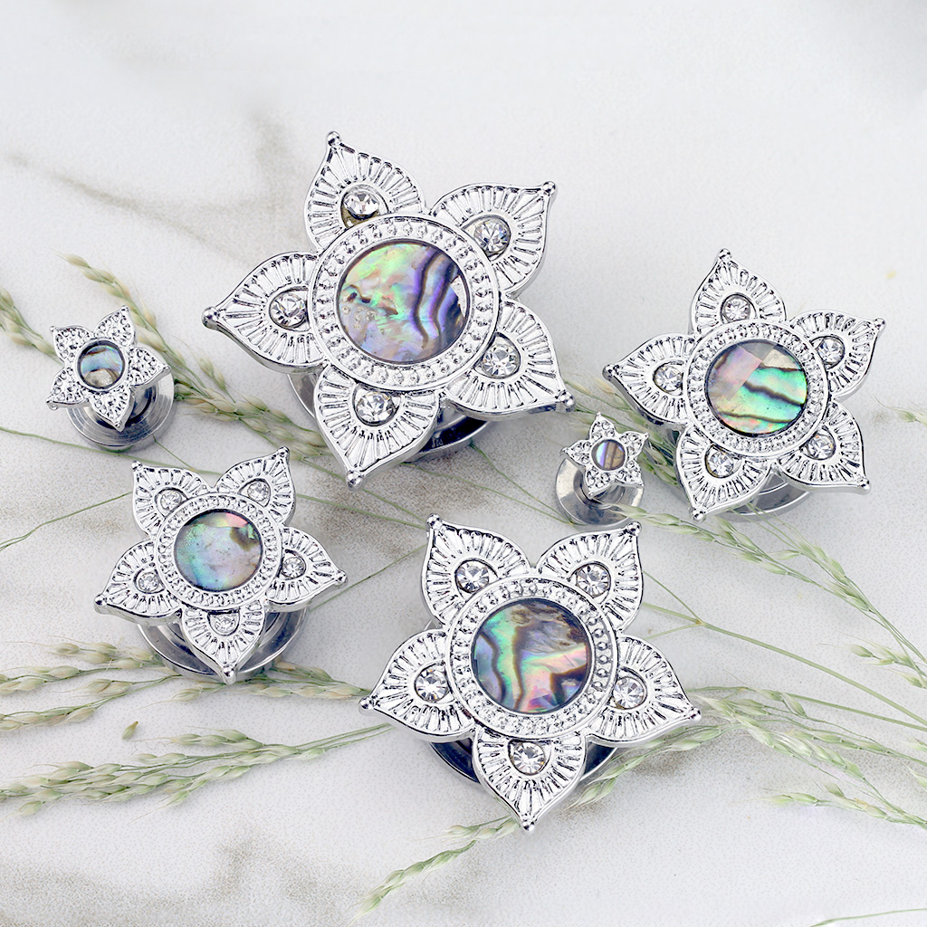 Plugg med lotusblomst og abalone