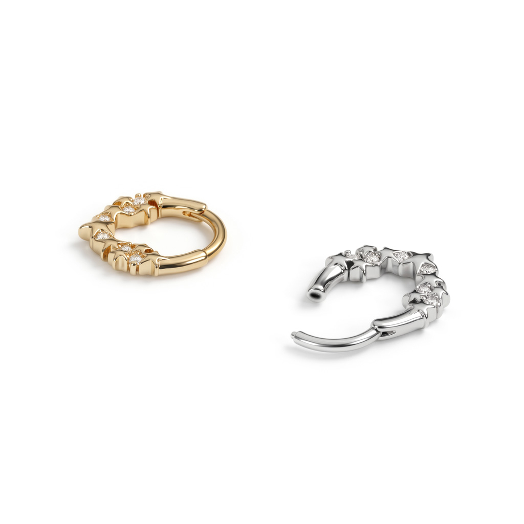 Forovervendt ring med stjerner og stener