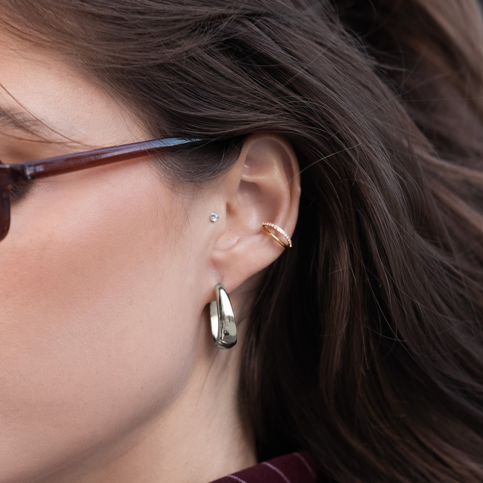 Dobbeltring med stener på den ene ringen