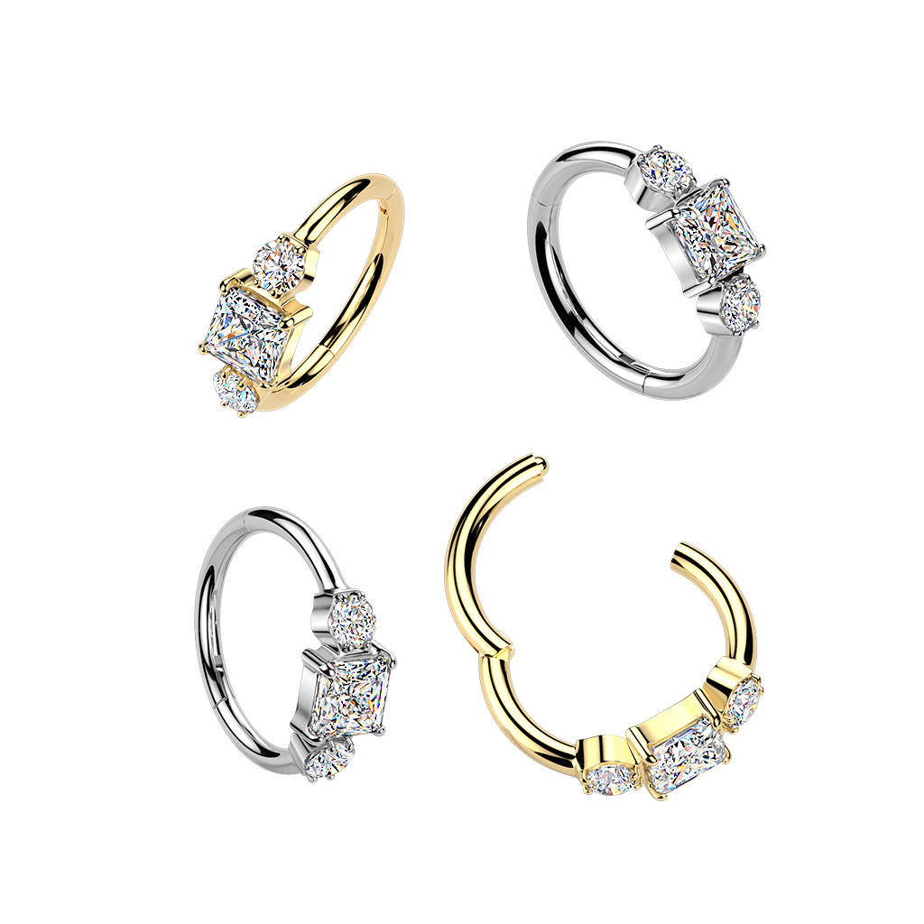 Hengslet titanring med tre CZ-stener