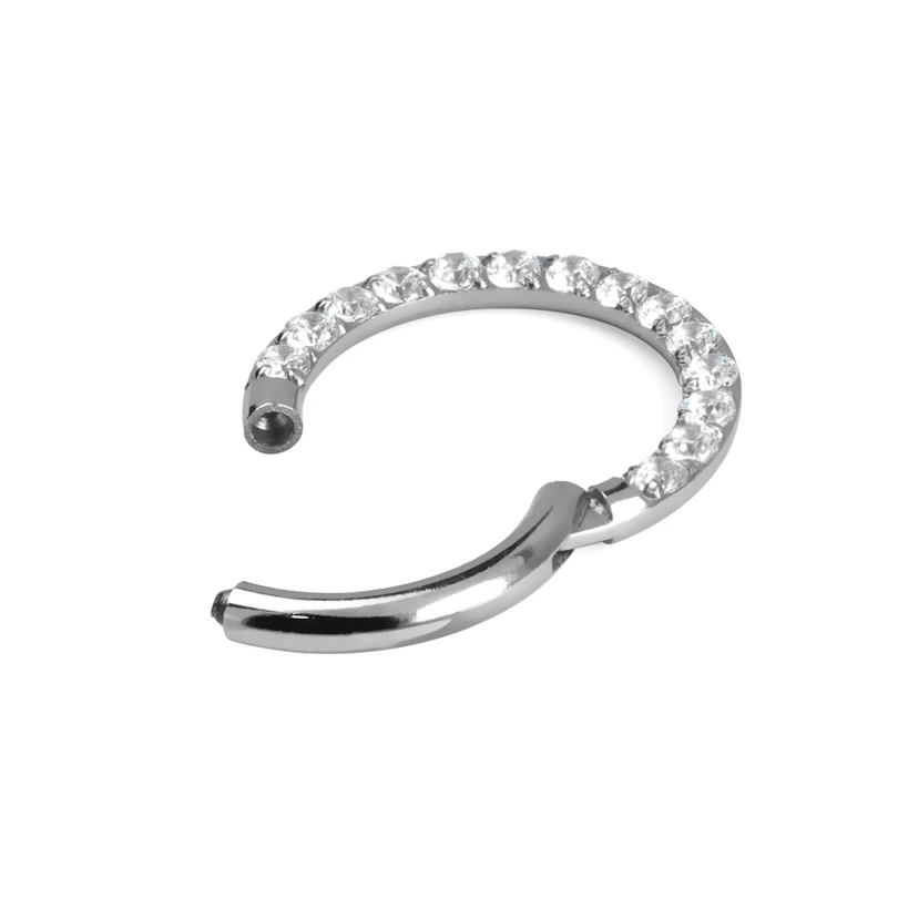 Hengslet ring i titan med stenrekke