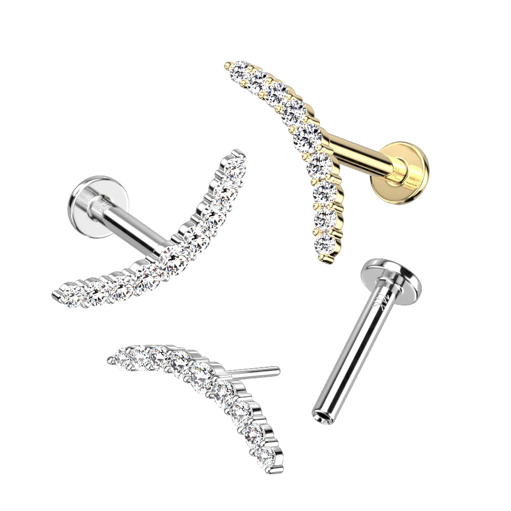 Push-in labret av 14K gull med fasettslipte stener i bue