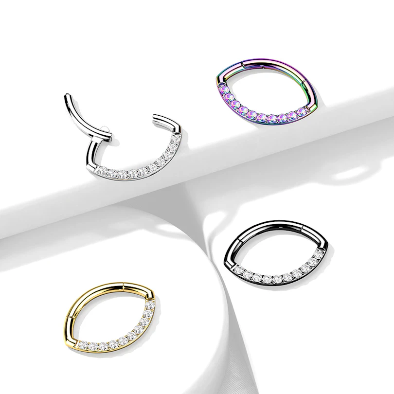 Hengslet ring med oval form og stenrekke